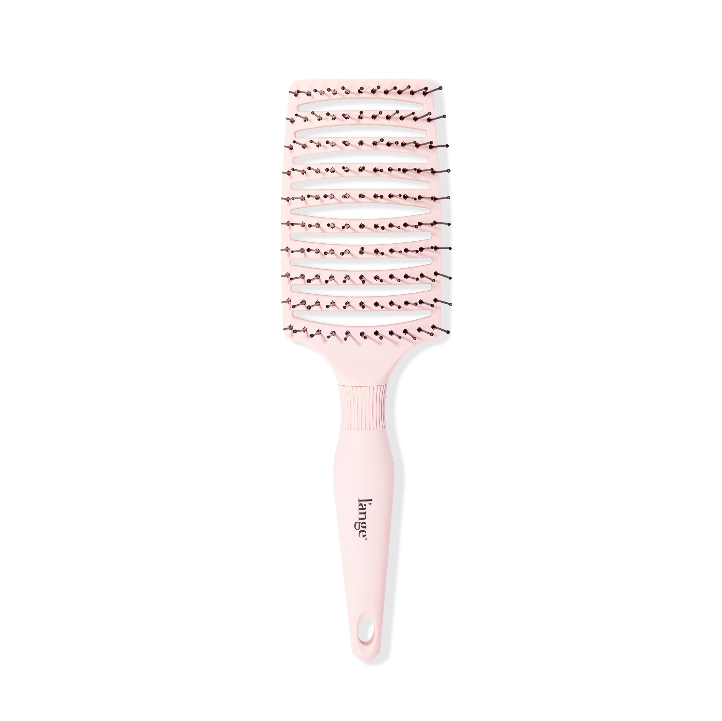 The wide pink flexible brush stand vertically, showing the vented paddle, bristles, and handle.