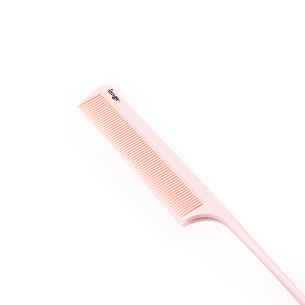 See the fine teeth of the pink detangling comb and the logo in this close-up. 