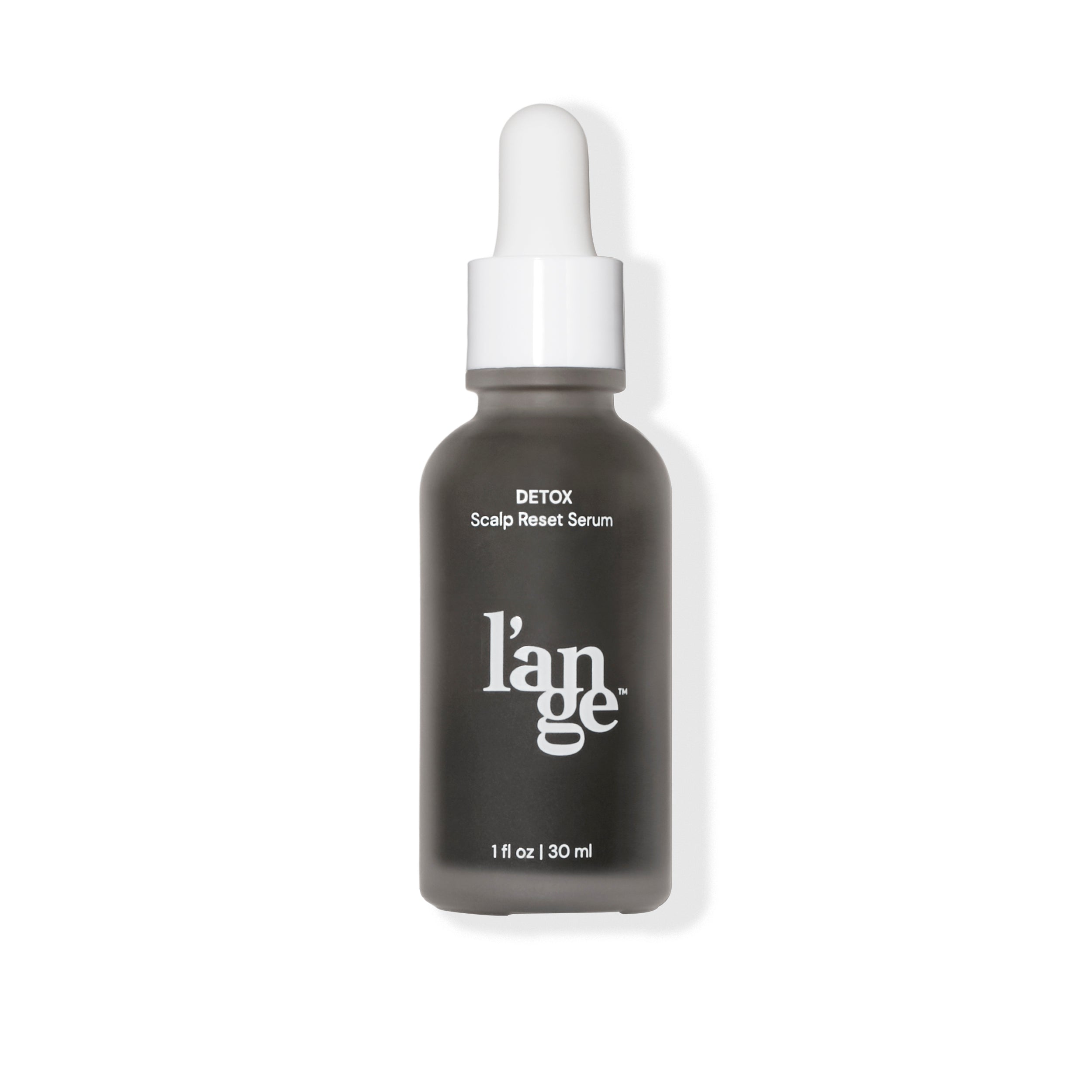 Clear 1fl oz bottle with dark gray Detox Scalp Rest Serum & L’ange logo in white font & white droplet
