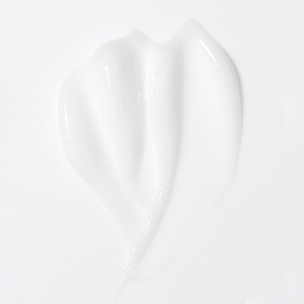 White 8fl oz bottle with Curl Care Shampoo and L’ange logo in black font and black tap