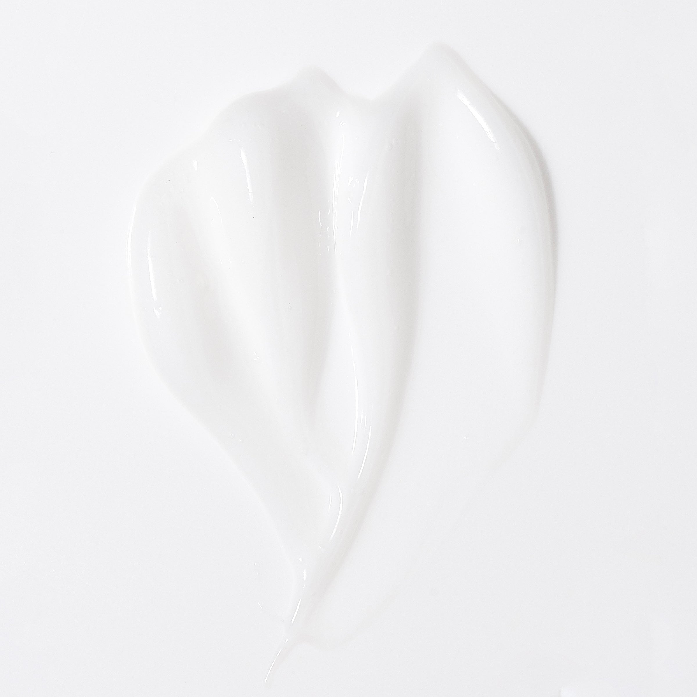 White 8fl oz bottle with Curl Care Shampoo and L’ange logo in black font and black tap