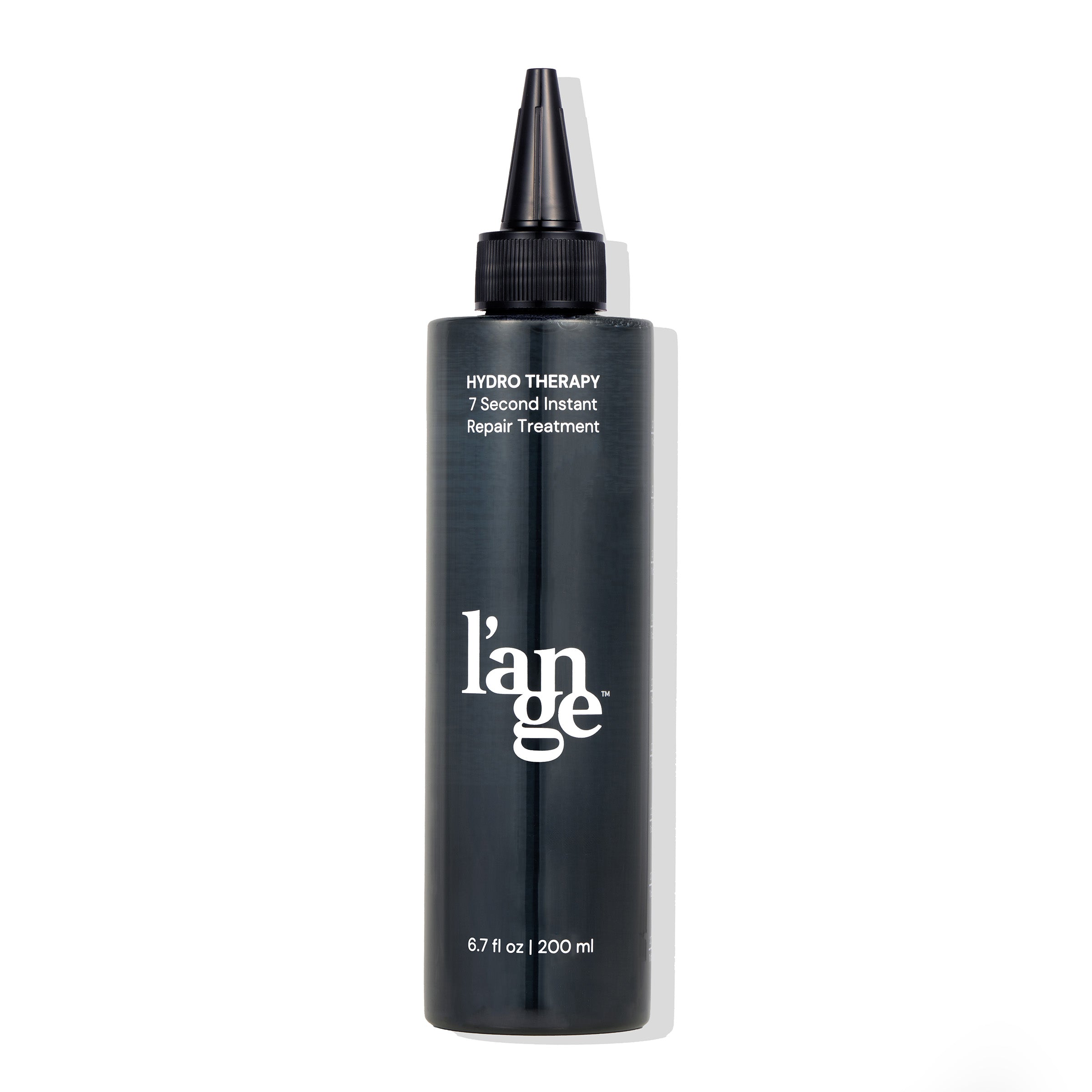 A sleek black bottle labeled "Hydro Therapy 7 Second Instant Repair Treatment" with a pointed applicator cap, containing 6.7 fl oz (200 ml) of product.