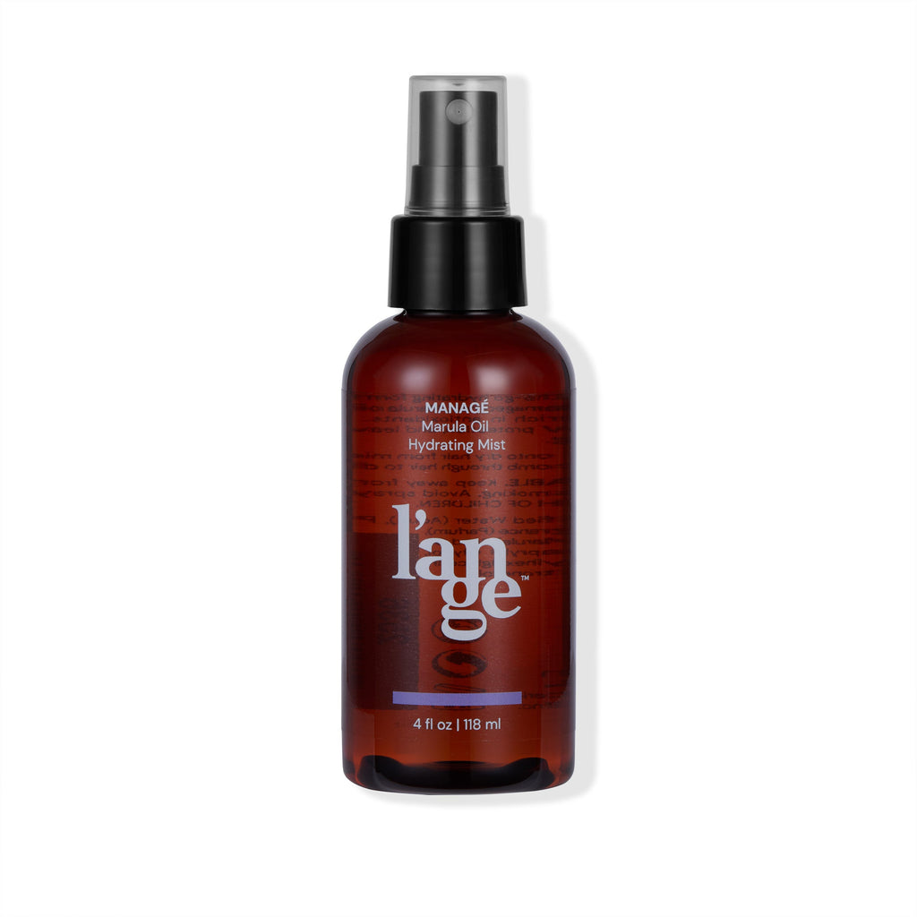 Brown bottle of Lange Managé Marula Oil Hydrating Mist with a black spray nozzle, labeled as 4 fl oz (118 ml).