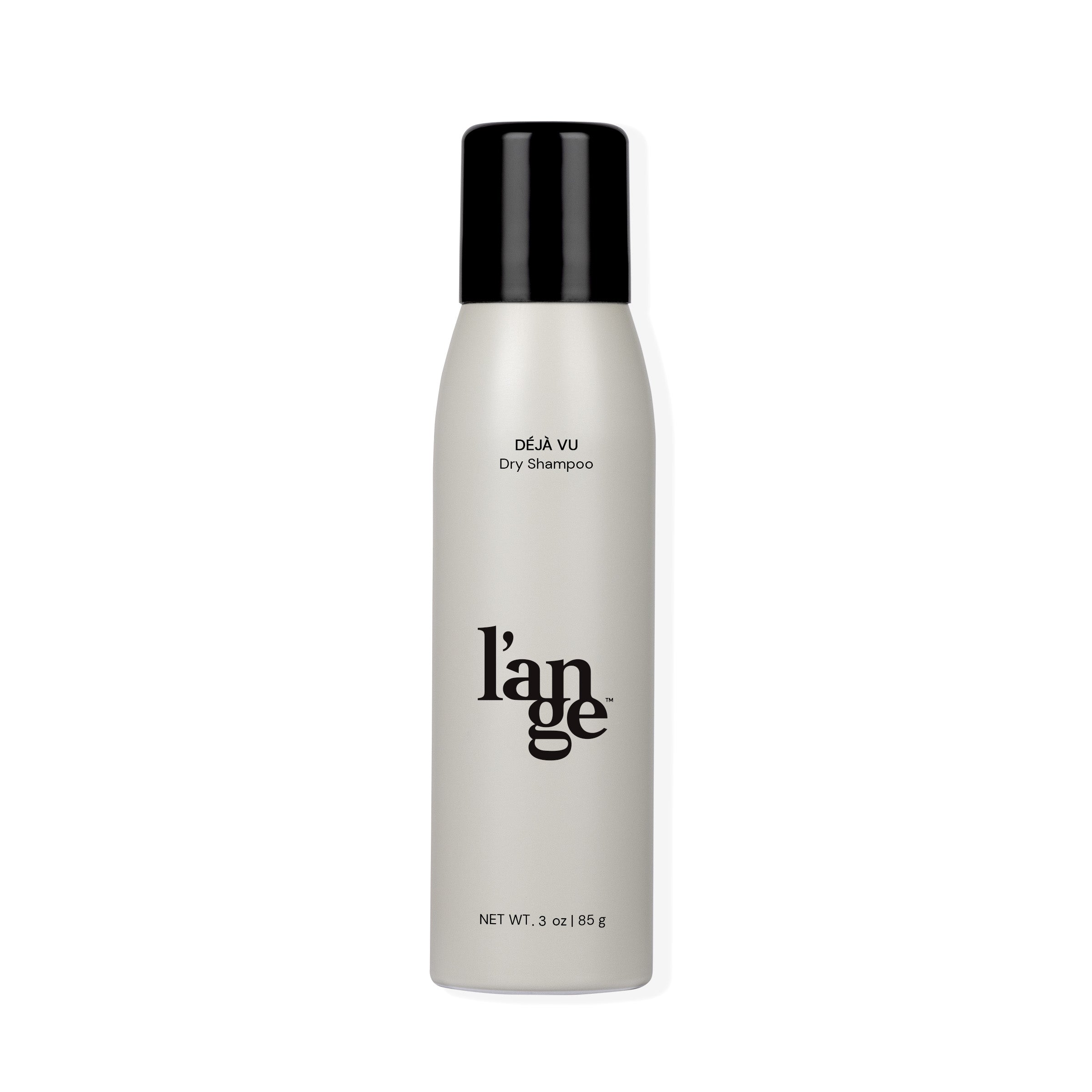 A sleek cylindrical bottle with a black cap, labeled "Déjà Vu Dry Shampoo" and featuring the brand name "l'ange" in bold lettering, containing 3 oz (85 g) of product.