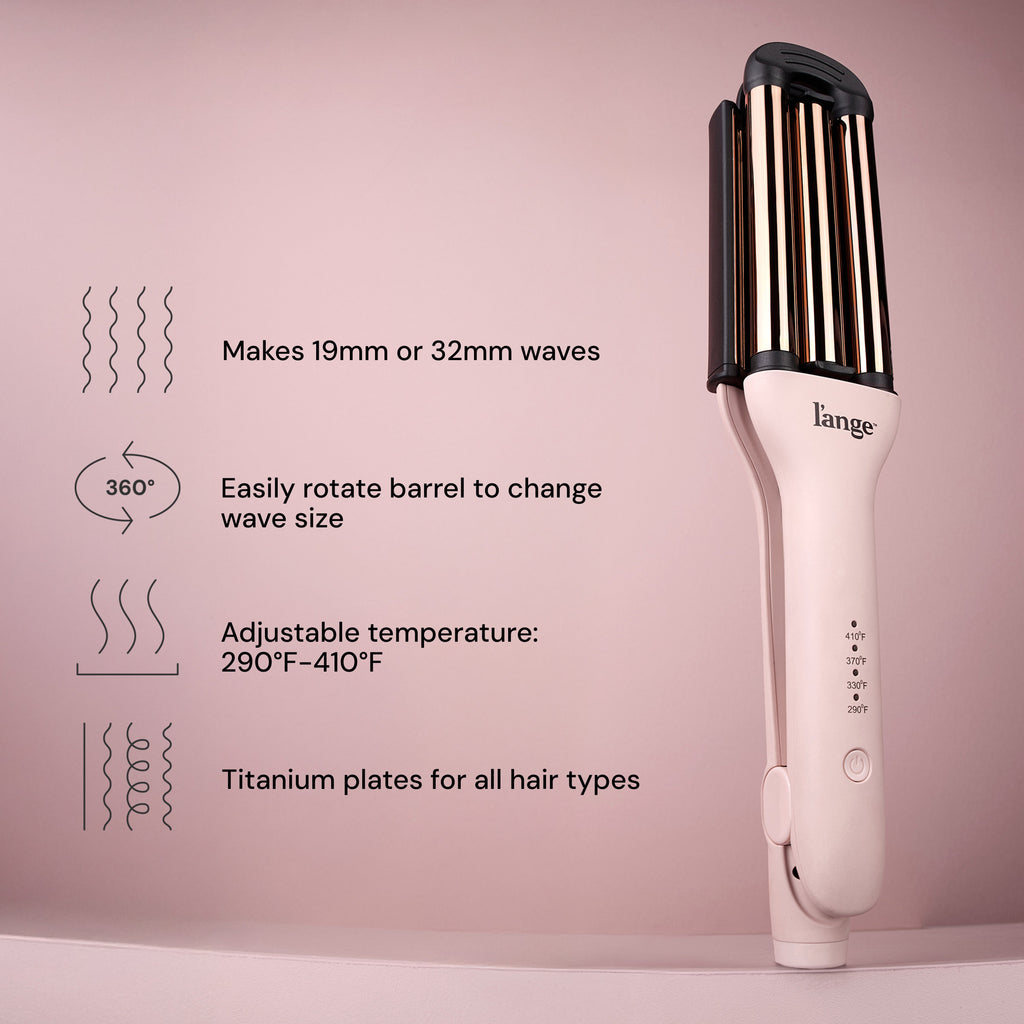 A hair styling tool in pink featuring a sleek design with titanium plates, offering adjustable temperatures from 290°F to 410°F, capable of creating 19mm or 32mm waves, and a barrel that rotates 360 degrees for easy wave size adjustment.
