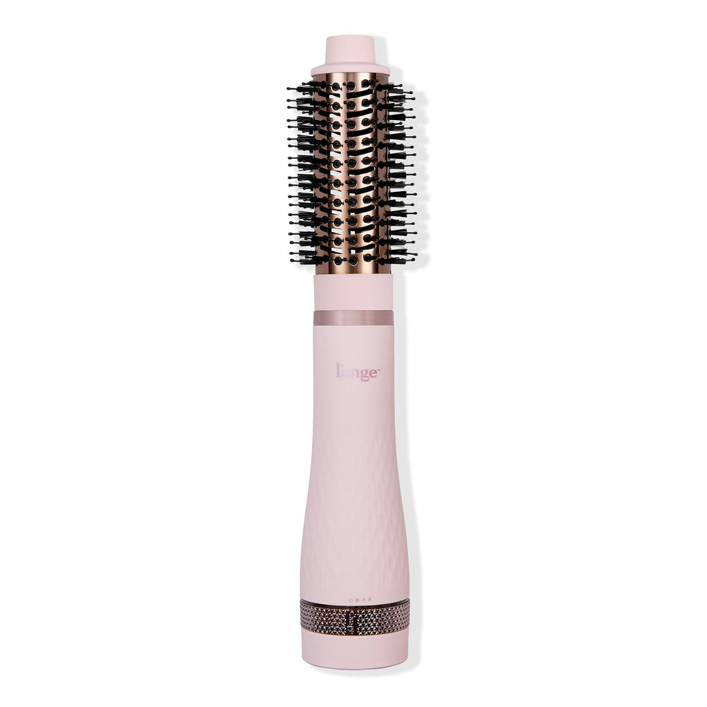 A pink and metallic round brush hair styling tool with bristles, designed for drying and styling hair simultaneously.