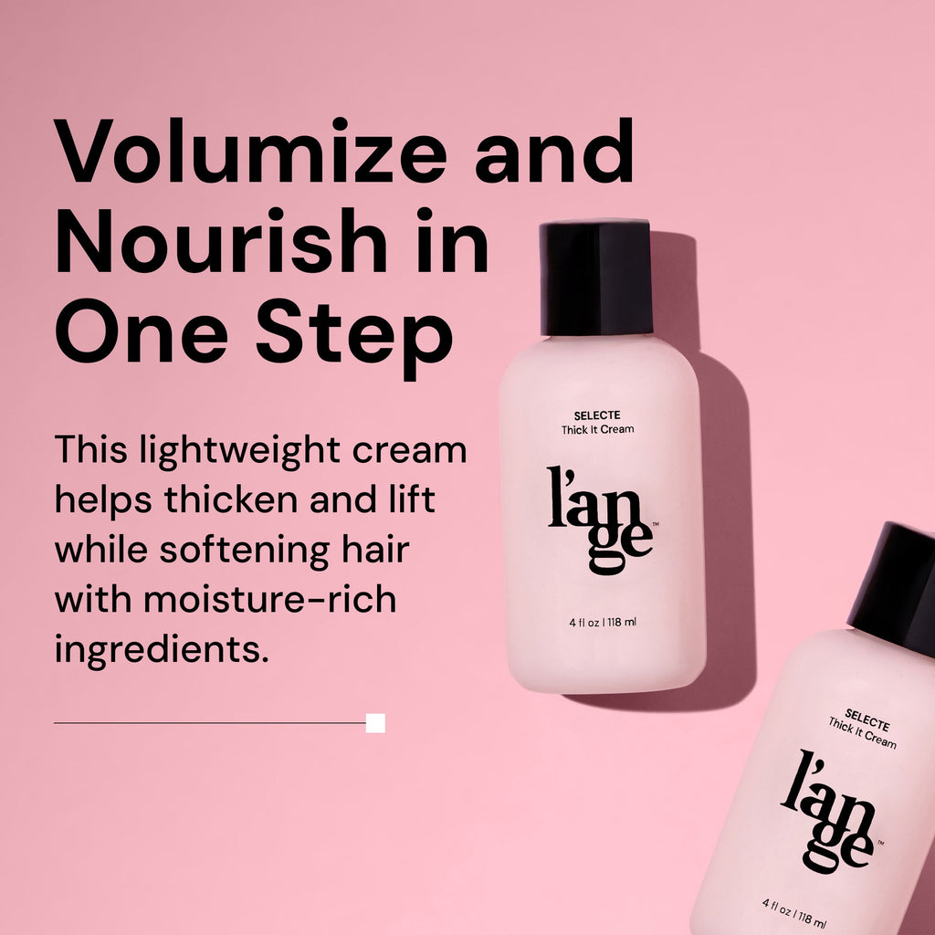 A light pink bottle of L’ange Selecte Thick It Cream lies angled on a matching pink background with a shadow. Bold text to the left reads: 'Volumize and Nourish in One Step.' Below, supporting text says: 'This lightweight cream helps thicken and lift while softening hair with moisture-rich ingredients.' The bottle is labeled 4 fl oz (118 ml).