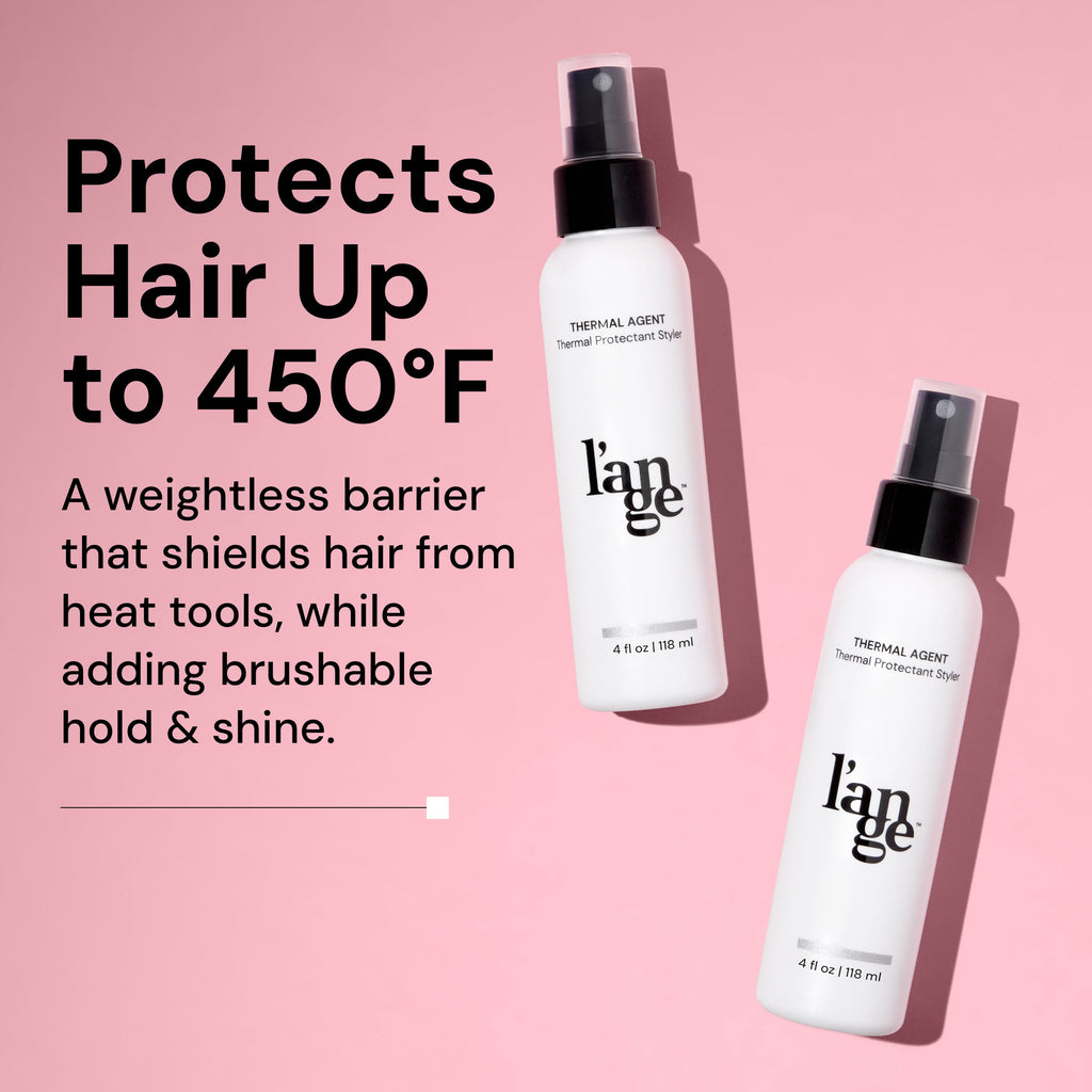 Thermal protectant styling spray, shields hair from heat up to 450°F, adds brushable hold and shine; 4 fl oz (118 ml) bottles on a pink background.