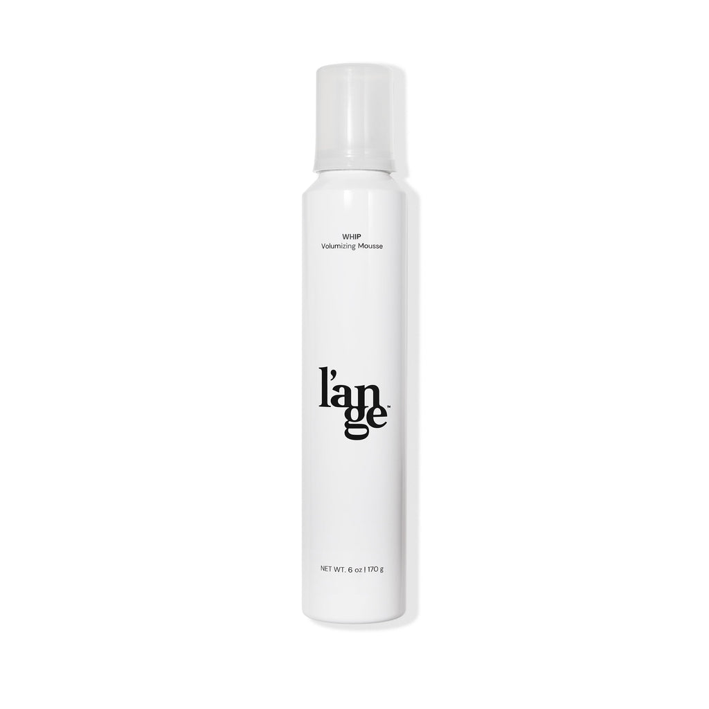 White 6 oz bottle with black font WHIP Volumizing Mousse, black L’ange logo & white plastic cover